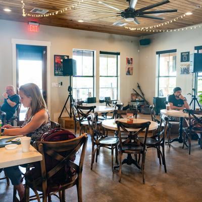 Interior, bar and diner tables, chairs, guests seating.
