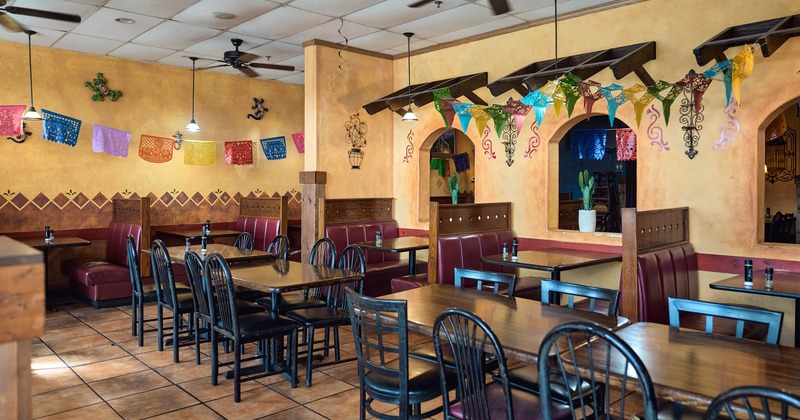 Interior, dining area, tables and seats ready for guests