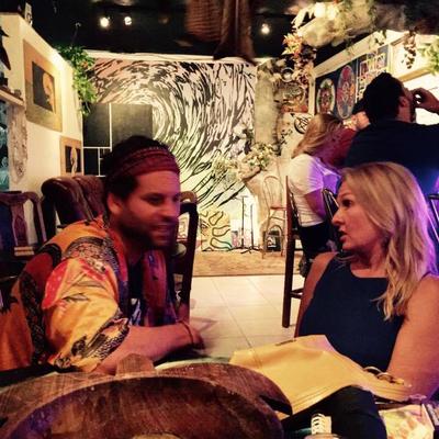 Guests sitting at their tables, talking.