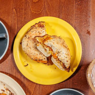 Everything bagel breakfast sandwich, top view.