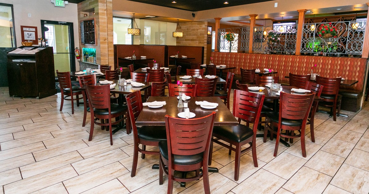 Interior, set dining tables, chairs, booths, restaurant exit