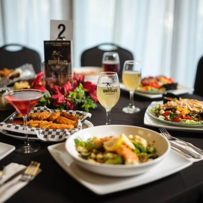 Assortment of dishes served on the table with drinks.