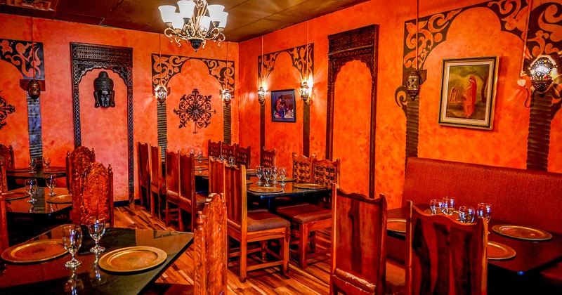 Indian-style design of the dining area, set dining tables