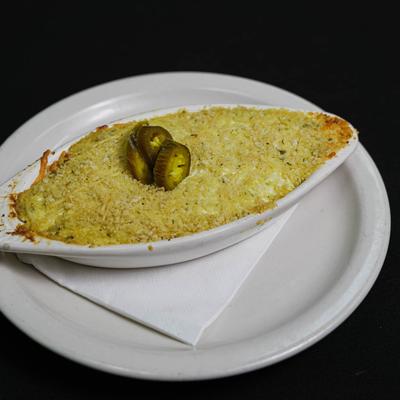 Jalapeno Popper Dip, with cream cheese, peppers, and toasted breading.