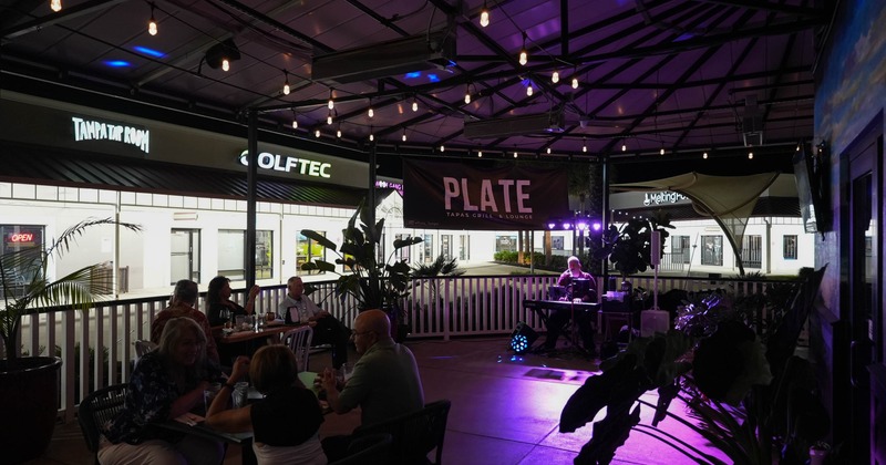 Exterior, patio area with guests