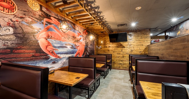 Interior, dining area with giant crab painted on the wall