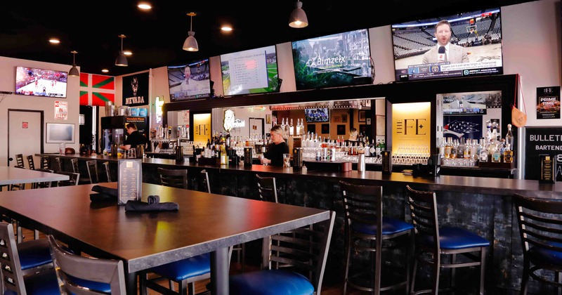 Interior, bar area, tables and chairs