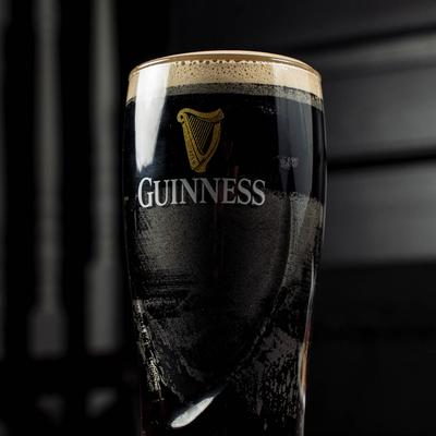 Guinness beer in glass.