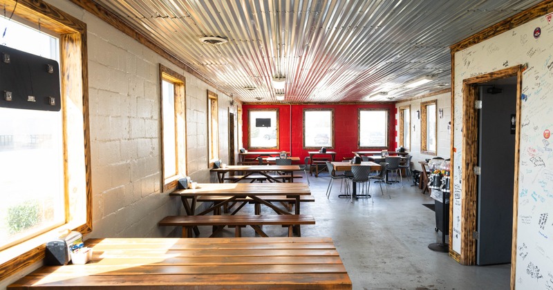 Interior seating area with tables and chairs
