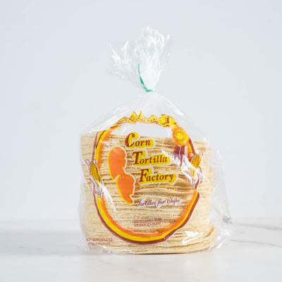 Clear plastic bag with corn tortillas.