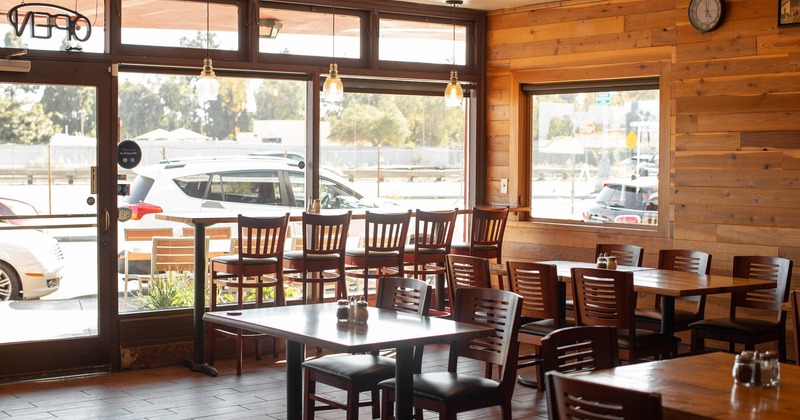 Interior, a window table with tall chairs, dining tables and seats