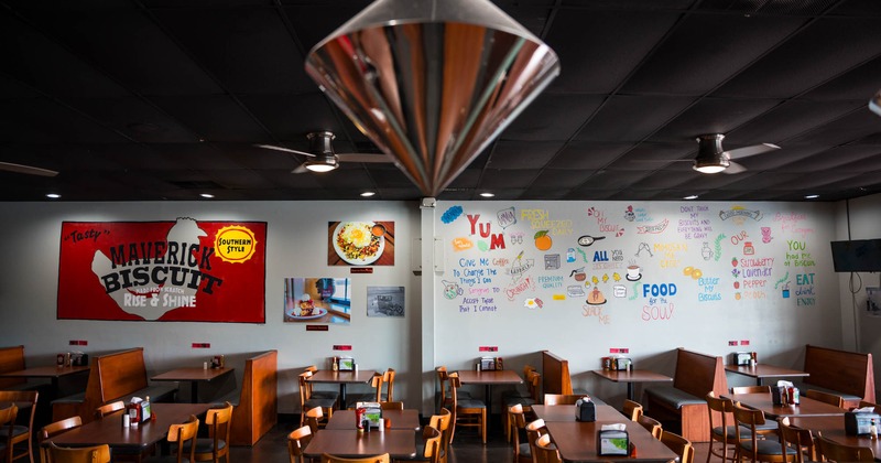 Interior, side view of seating area, decorations on the wall