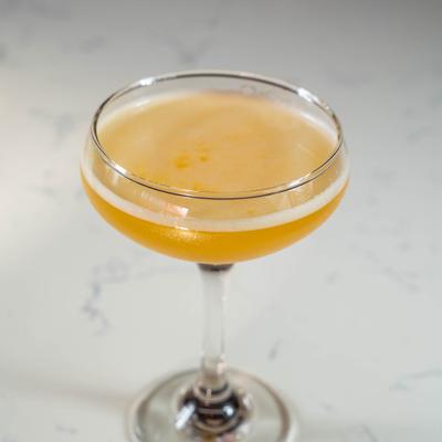 Pornstar Martini cocktail served in a coupe glass.