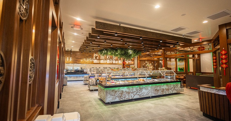 Interior, buffet area, large buffet tables, wooden interior details, tile flooring