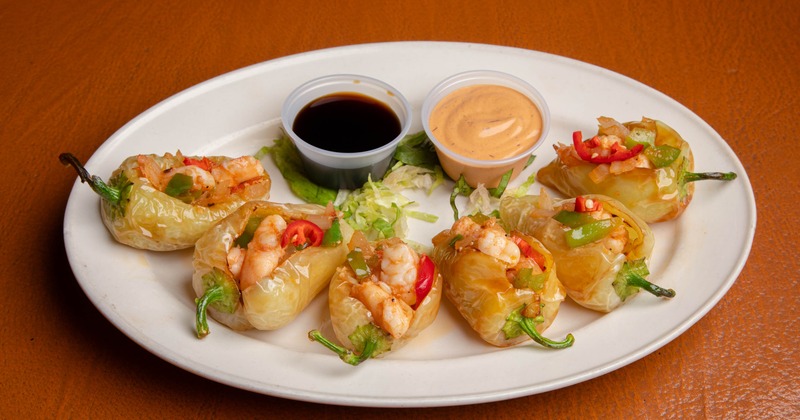 Shrimp stuffed peppers served with two dipping sauces