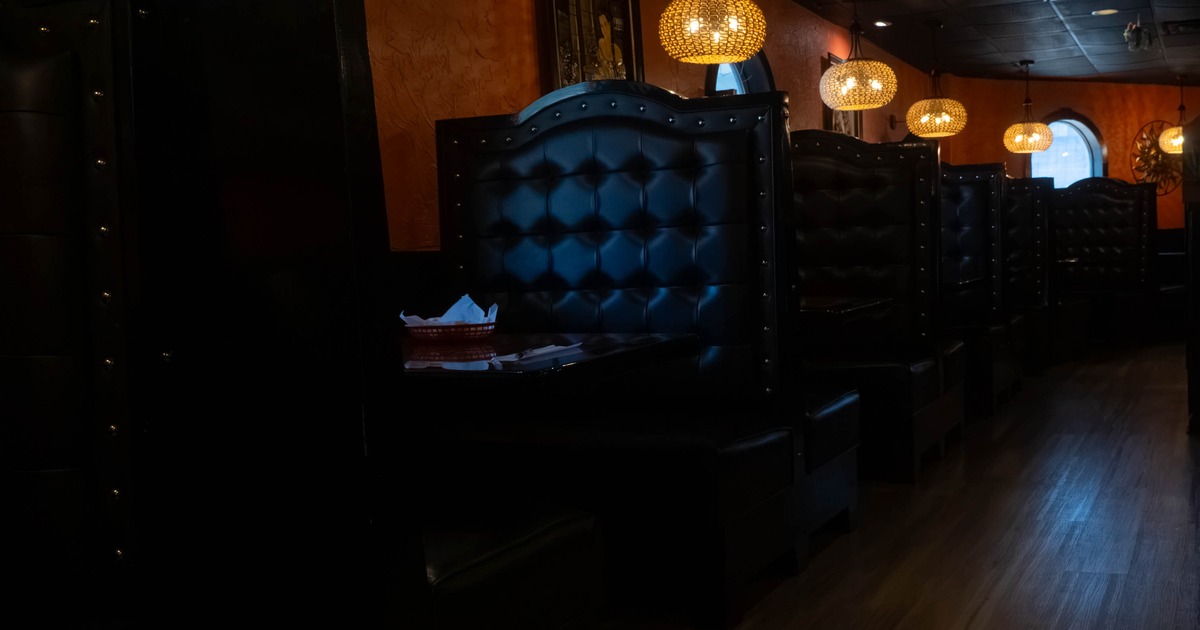 Interior, leather booths all lined up