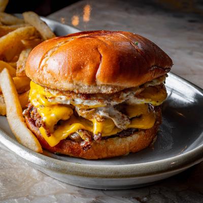 Cheeseburger with fried eggs.