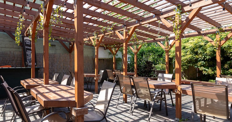 Patio, wooden tables with chairs