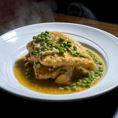 Crispy chicken, potatoes, peas, garlic, white wine oregano sauce.