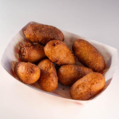 Hot Dog Nuggets served in a paper tray.