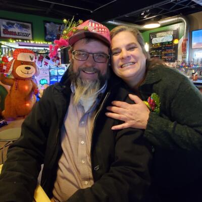 A couple of guests posing for the shot inside