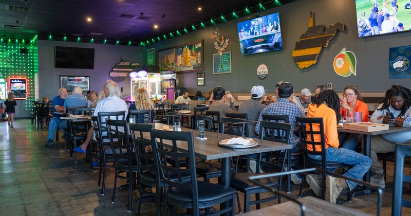 Interior, tables and chairs, guests sitting and chatting