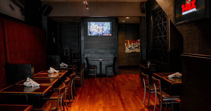 Interior, tables and chairs, big tv screen