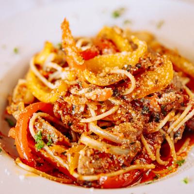 Spicy Italian sausage pasta in marinara sauce.