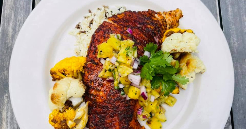 Fish fry with cauliflower and red onion