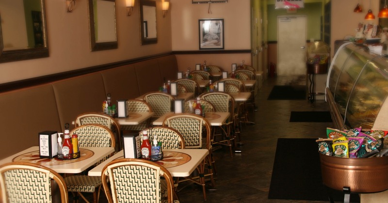 Interior, seating area, tables for two and four people, ready for guests
