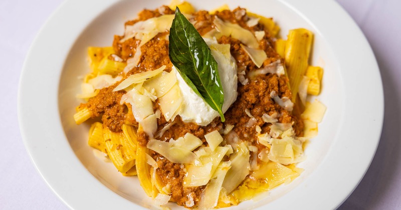 Three Meat Bolognese served over homemade pasta