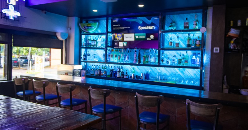 Bar area with liquor bottles on the shelf