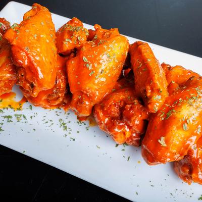 A closeup on chicken wings.