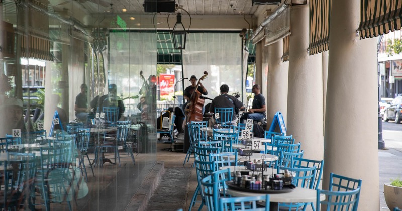 Exterior, seating area outside the cafe, a band performing live
