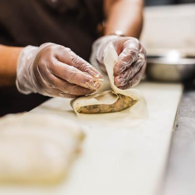 Person prepare food.