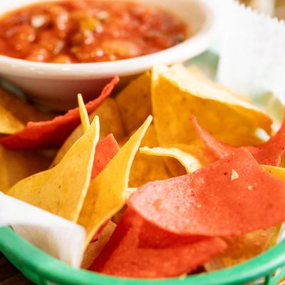 A closeup on chips and salsa.