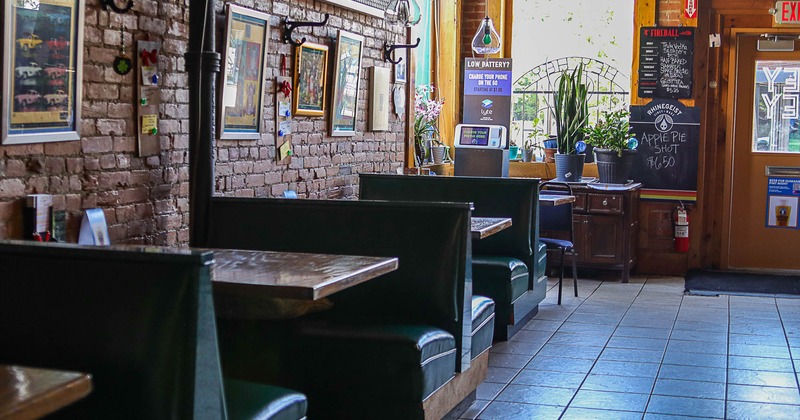 Inside, booth seating area on the left