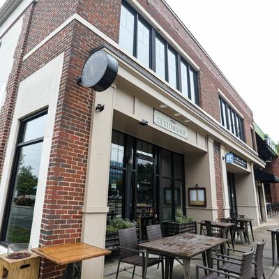 Exterior, restaurant front view, tables and chairs in front the entrance