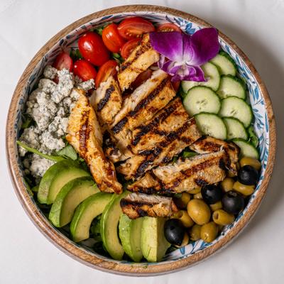 Salad bowl - grilled chicken, cucumbers, cherry tomatoes, avocados, blue cheese, olives.