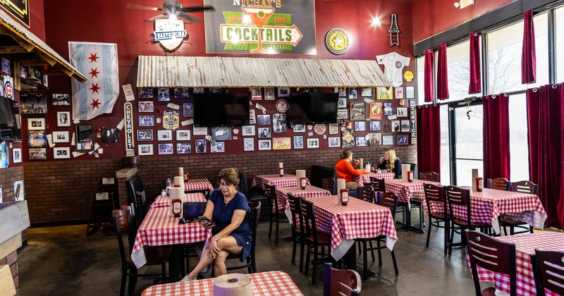 Interior, diner area, tables, chairs, guests