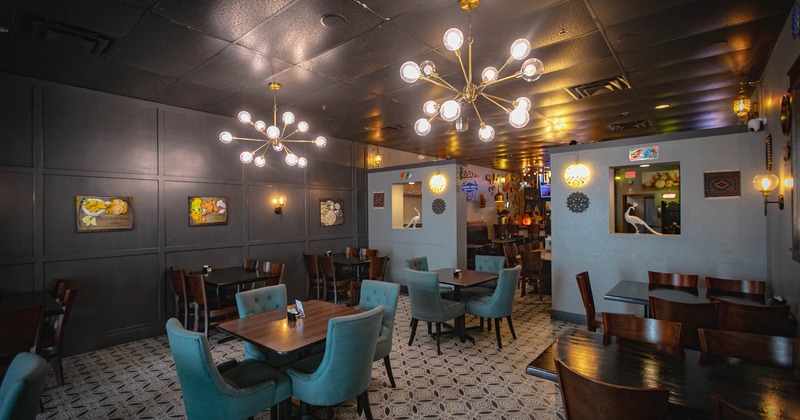 Interior, tables and chairs in seating area