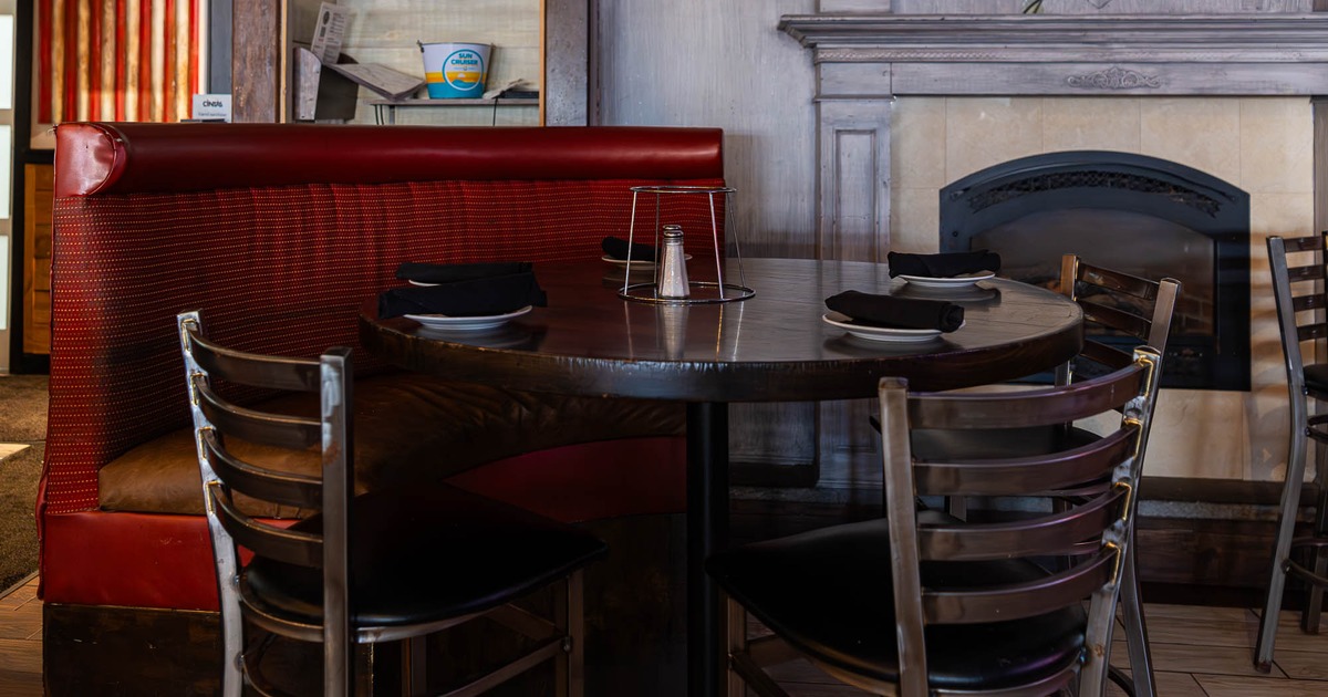 Dining tables by the fireplace