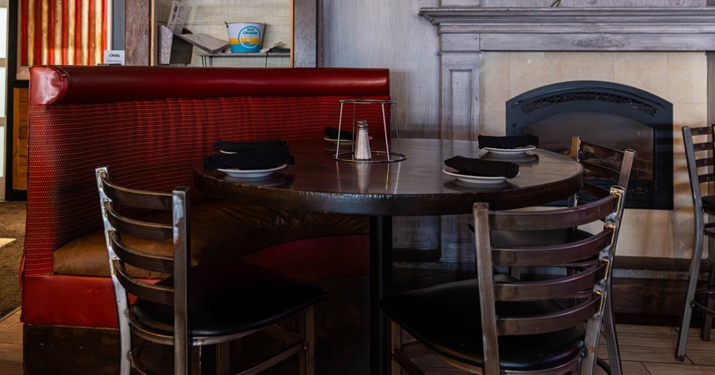 Dining tables by the fireplace