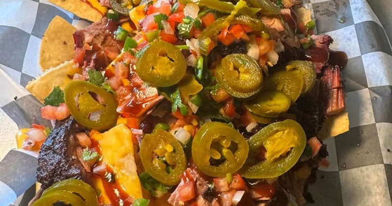 A plate of loaded nachos