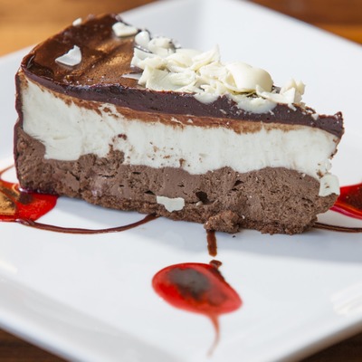 Black and white chocolate mousse cake piece.