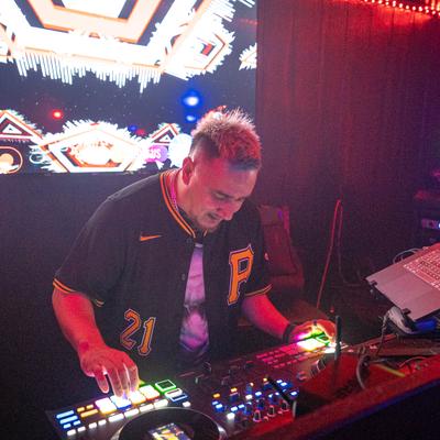 The DJ playing music.