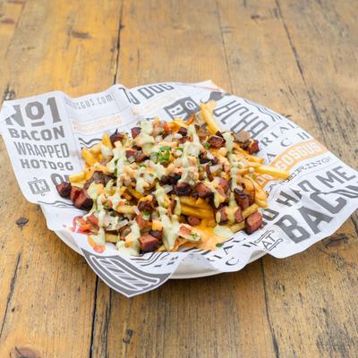 Fries, bacon wrapped hotdog slices, grilled onions, pico, chipotle and avocado crema