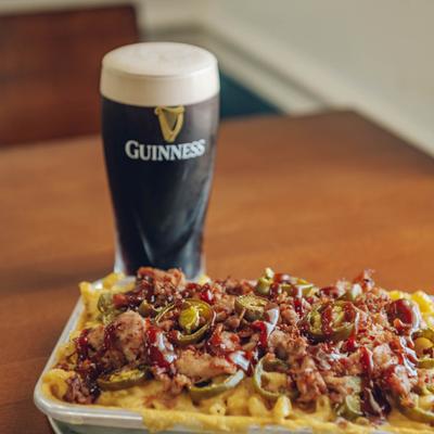 The flying pig meal and a dark Guinness beer.