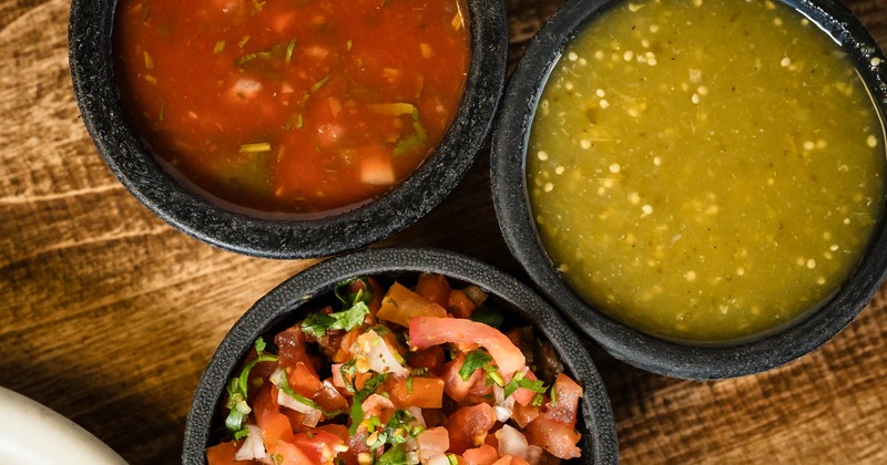 Red salsa, green salsa, and pico
