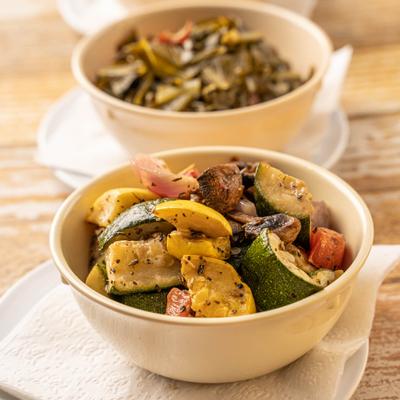 Sides of roasted veggies and collard greens.